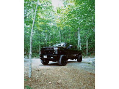 Cognito 4-Inch Elite Lift Kit with King 2.5 Reservoir Shocks for 20-25 Silverado/Sierra 2500/3500 2WD/4WD